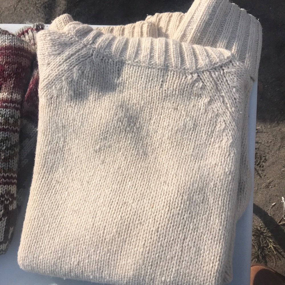 White turtleneck sweater